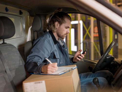 medium-shot-man-sitting-car